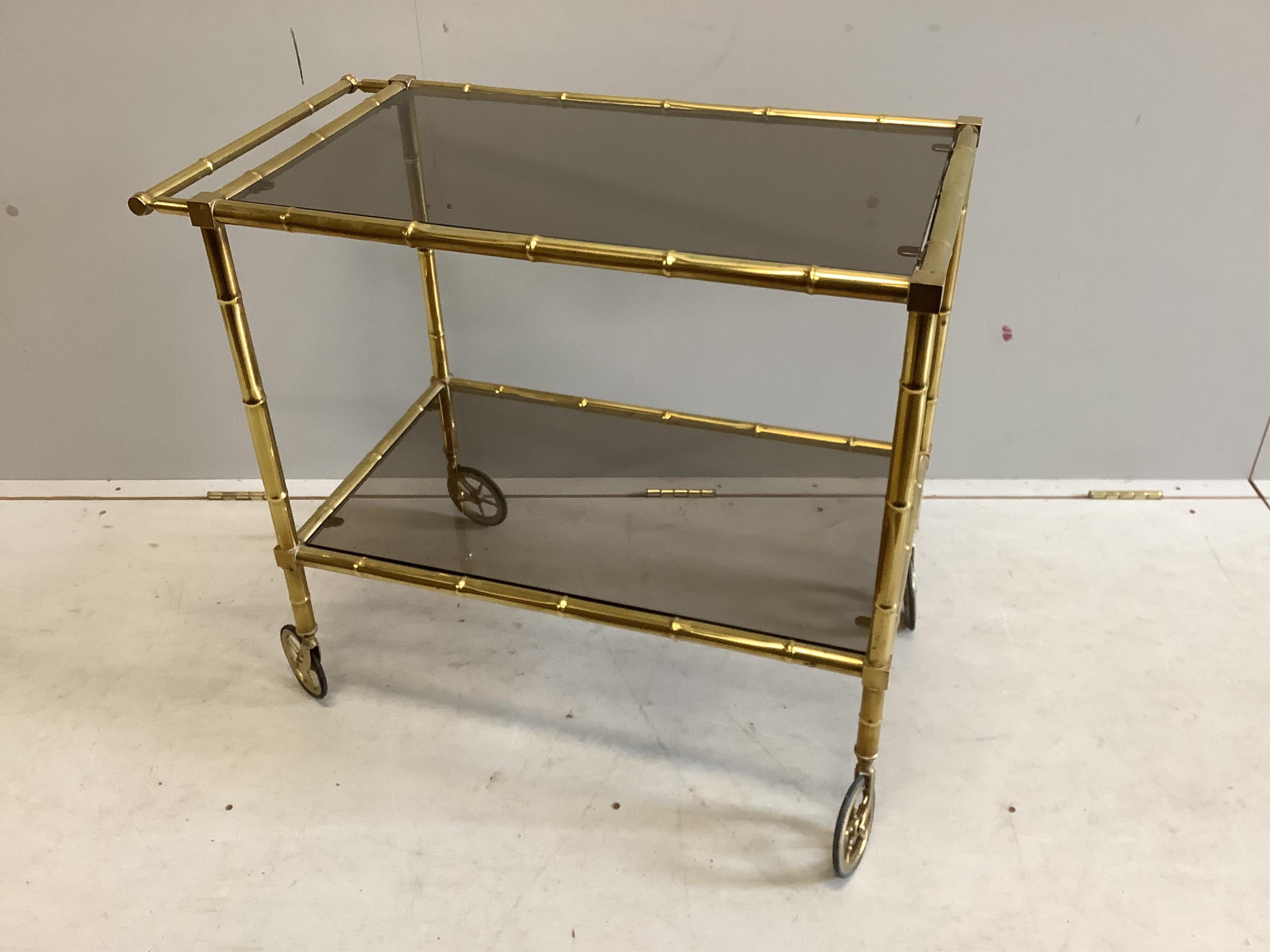 A Maison Jansen style faux bamboo brass two tier trolley, width 75cm, depth 42cm, height 65cm